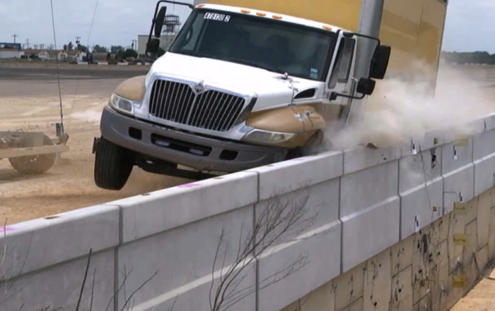 truck crash into traffic barrier