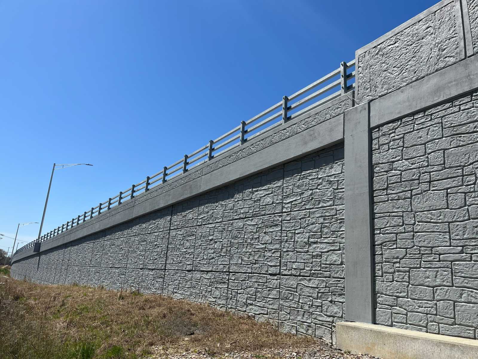 3DDEAB30-C3C4-4AA1-B83F-A78F340AAA59 T-Wall retaining wall front face