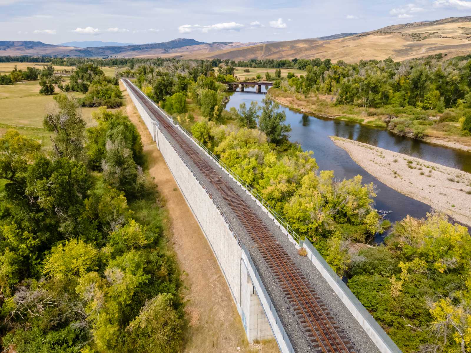 back-to-back T-Walls supporting railroad tracks